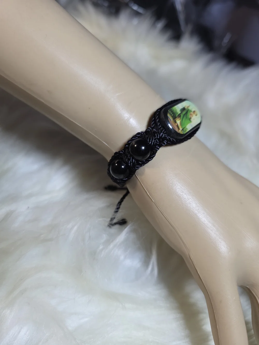 Black Cord Religious Bracelet with Green Saint Image